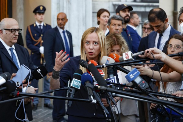 Italian Prime Minister Giorgia Meloni talks with journalists at the end of a meeting with the opposition, at Palazzo Chigi in Rome, Italy, 11 August 2023 (EPA-EFE/FABIO FRUSTACI)