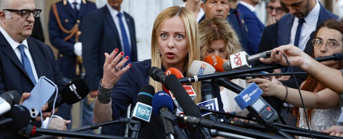 Italian Prime Minister Giorgia Meloni talks with journalists at the end of a meeting with the opposition, at Palazzo Chigi in Rome, Italy, 11 August 2023 (EPA-EFE/FABIO FRUSTACI)
