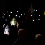 People hold up their phones after a protest march on the fifth anniversary of the assassination of journalist Daphne Caruana Galizia in Valletta, Malta, on October 16, 2022. Press freedom groups are calling for reforms to improve media safety in Malta. Credits: Reuters/Darrin Zammit Lupi