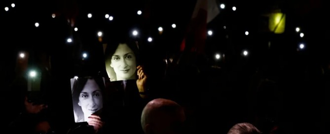 People hold up their phones after a protest march on the fifth anniversary of the assassination of journalist Daphne Caruana Galizia in Valletta, Malta, on October 16, 2022. Press freedom groups are calling for reforms to improve media safety in Malta. Credits: Reuters/Darrin Zammit Lupi