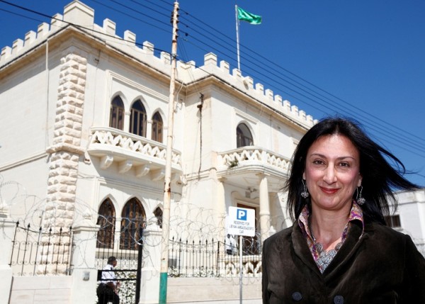 Maltese investigative journalist Daphne Caruana Galizia poses outside the Libyan Embassy in Valletta April 6, 2011. Investigative journalist Caruana Galizia was killed after a powerful bomb blew up a car killing her in Bidnija, Malta, in October 16, 2017.